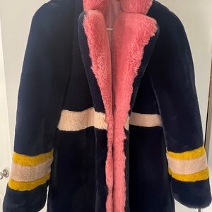 Apparis Navy with contrast pink, beige and gold faux fur jacket.